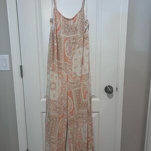 FP Movement by Free People Paisley Jumpsuit in Peach and Cream